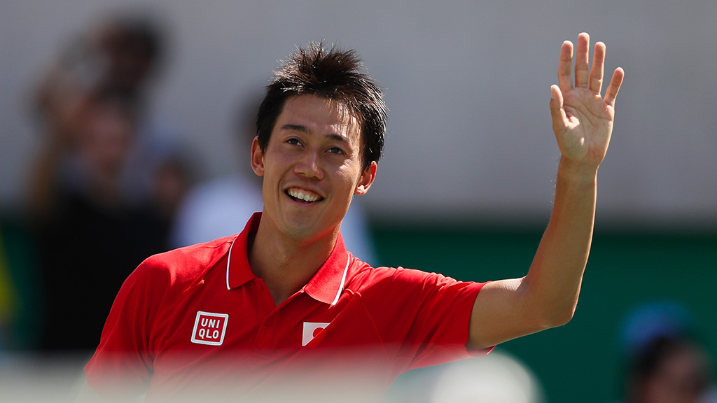 Japan's Kei Nishikori salutes spectators after defeating Spain's Albert Ramos-Vinolas in the men's tennis competition at the 2016 Summer Olympics in Rio de Janeiro, Brazil, Saturday, Aug. 6, 2016. (AP Photo/Vadim Ghirda)