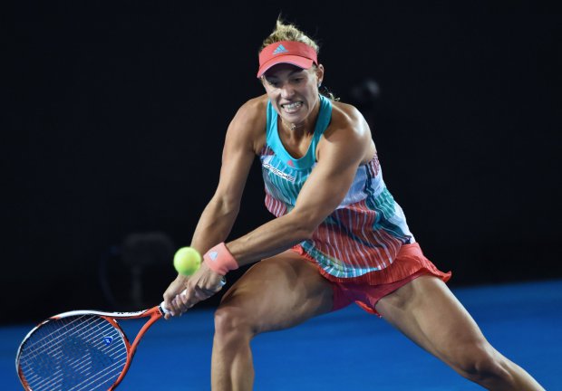 Germany's Angelique Kerber plays a backhand return during her women's singles final match against Serena Williams of the US on day thirteen of the 2016 Australian Open tennis tournament in Melbourne on January 30, 2016. AFP PHOTO / SAEED KHAN-- IMAGE RESTRICTED TO EDITORIAL USE - STRICTLY NO COMMERCIAL USESAEED KHAN/AFP/Getty Images